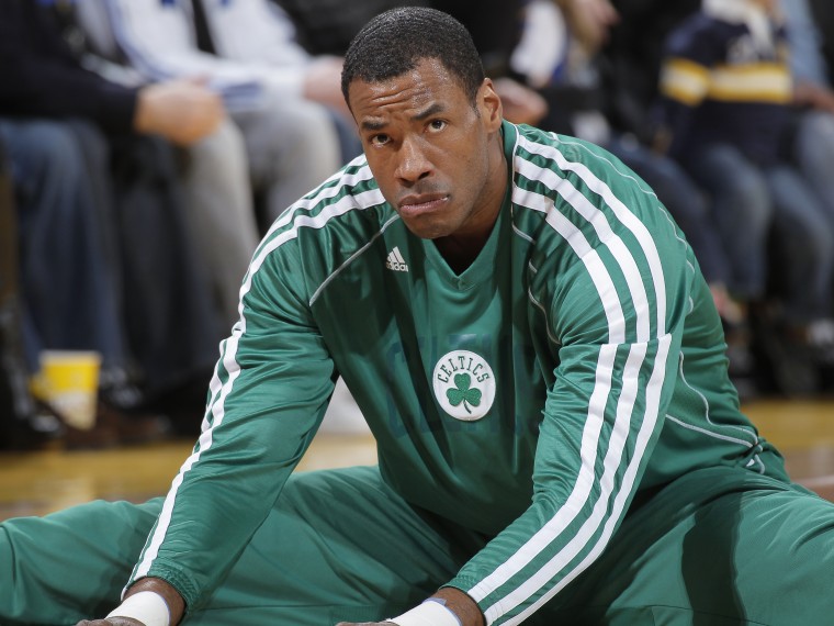 Jason Collins #98 of the Boston Celtics warms up in a game against the Golden State Warriors on December 29, 2012 at Oracle Arena in Oakland, California. (Photo by Rocky Widner/NBAE via Getty Images)