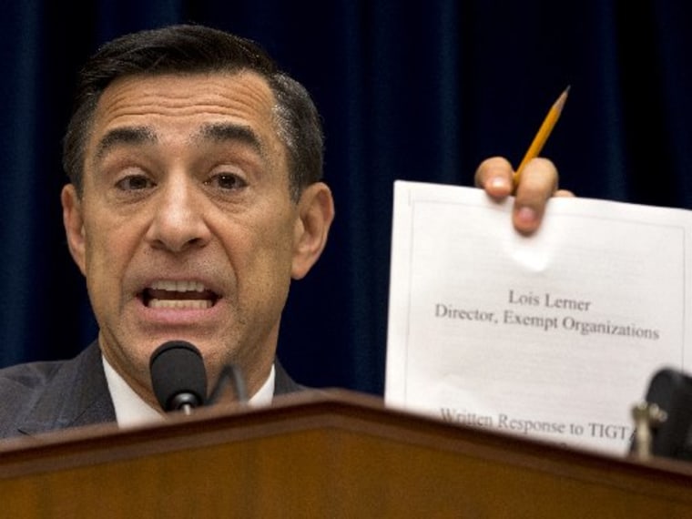 House Oversight Committee Chairman Rep. Darrell Issa, R-Calif. holds up a document as he speaks to IRS official Lois Lerner on Capitol Hill in Washington, Wednesday, May 22, 2013, during the committee's hearing to investigate the extra scrutiny IRS...