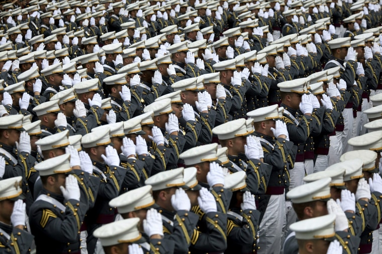 The 2010 graduating class of the United States Military Academy at West Point salutes President Back Obama as he is about to walk on stage during graduation ceremonies on May 22, 2010 in West Point, New York. (Photo by Michael Nagle/Getty Images)