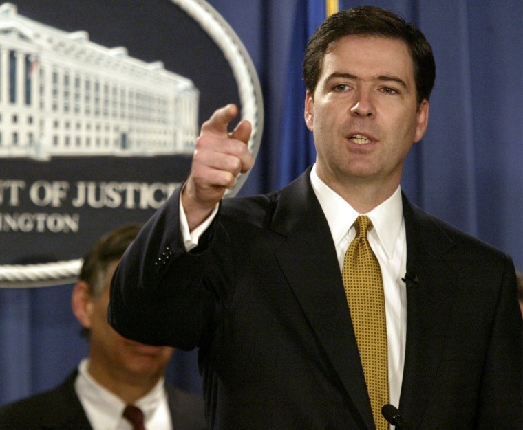 FILE - In this Jan. 14, 2004 file photo, Deputy Attorney General James Comey gestures during a news conference in Washington. President Barack Obama is preparing to nominate former Bush administration official James Comey to head the FBI, people...