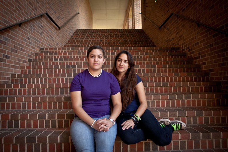 Left to Right: Twin sisters, Nicole and Victoria Rodriguez, pose for a portrait on the campus of where they attend school at St. Mary's University in San Antonio, Texas on May 14, 2013. (Photo by Erin Trieb for msnbc)