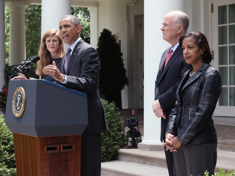 U.S. President Barack Obama speaks as former aide Samantha Power (L), U.S. Ambassador to the United Nations Susan Rice (R) and incumbent National Security Adviser Tom Donilon (2L) listen during a personnel announcement at the Rose Garden of the White...