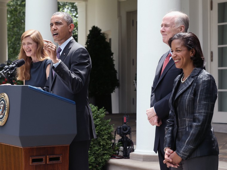 U.S. President Barack Obama speaks as former aide Samantha Power (L), U.S. Ambassador to the United Nations Susan Rice (R) and incumbent National Security Adviser Tom Donilon (2L) listen during a personnel announcement at the Rose Garden of the White...