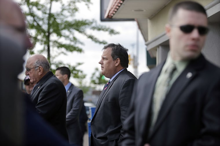 New Jersey Gov. Chris Christie, center, stands in Manville, N.J., Monday, May 13, 2013, during a campaign event. (Photo by Mel Evans/AP)