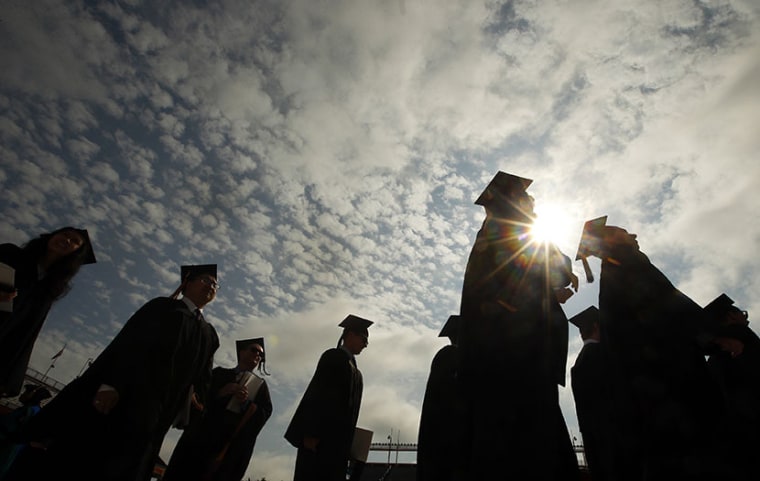 Graduating students arrive for Commencement Exercises at Boston College in Boston, Massachusetts May 20, 2013. (Photo by Brian Snyder/Reuters)