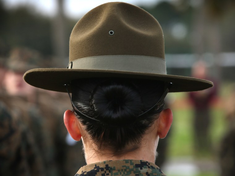 Drill Instructor speaks to her female Marine recruits during boot camp February 27, 2013 at Parris Island, South Carolina. (Photo by Scott Olson/Getty Images)