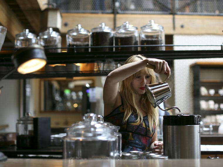 A barista prepares a drink at a coffee shop in San Francisco, California May 8, 2013. (Photo by Robert Galbraith/Reuters)