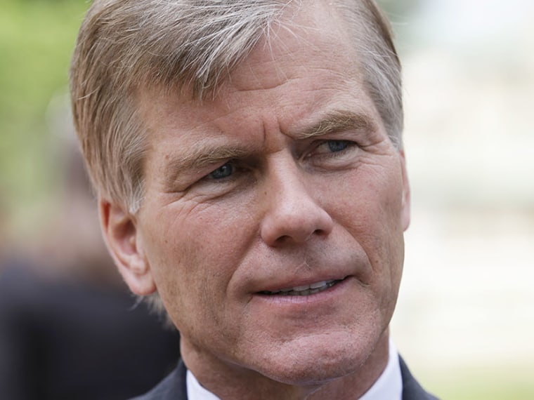 Virginia Gov. Bob McDonnell gestures as he answers reporters questions in  Richmond, Va., Monday, June 24, 2013. McDonnell answered questions on the new state laws taking effect July 1. (Photo by Steve Helber/AP)