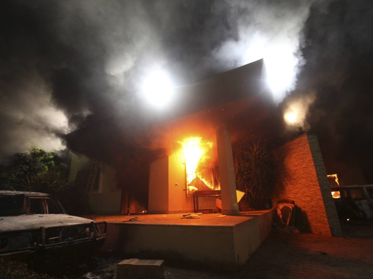 Image: File of the U.S. Consulate in Benghazi is seen in flames during a protest