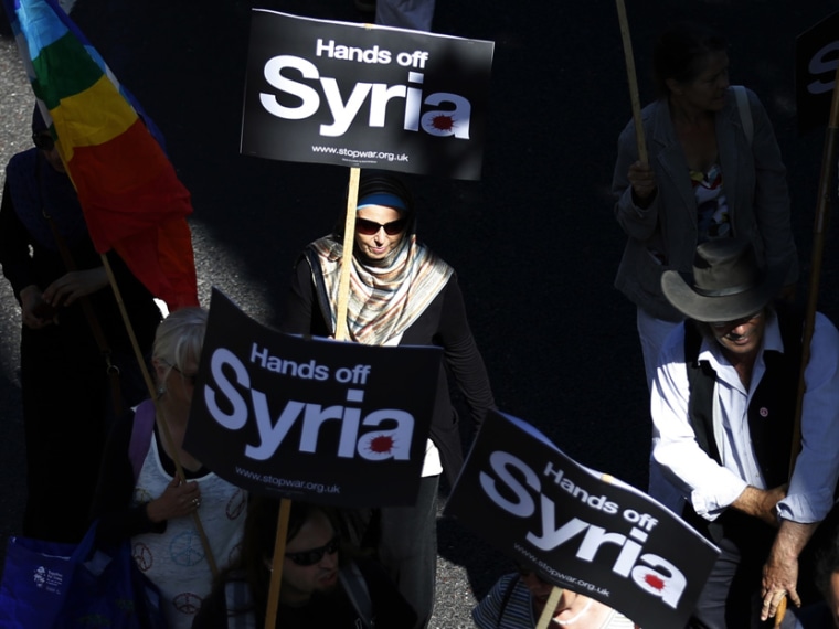 Protesters demonstrate against potential strikes on Syria in London - 9/1/2013
