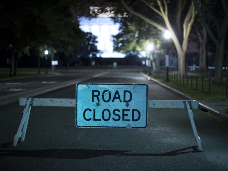 A barricade leading to the Lincoln Memorial prevents access to tourist buses in Washington