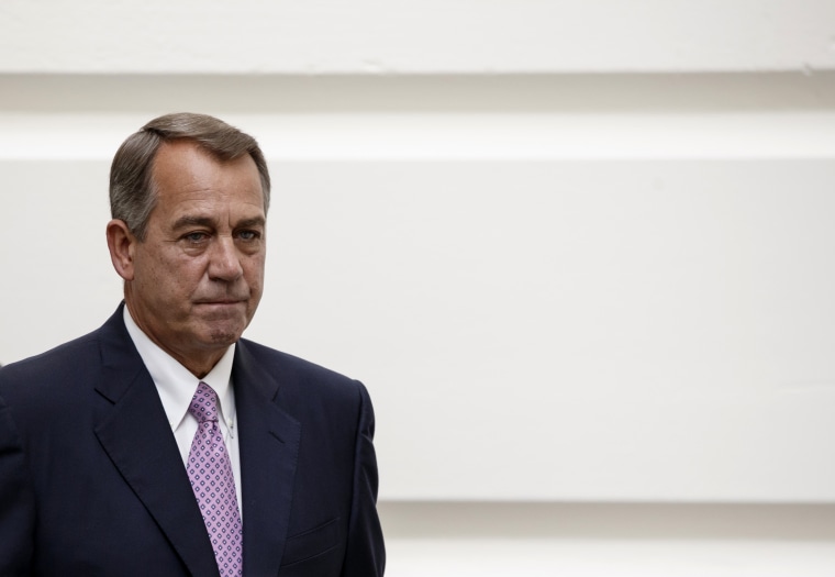 House Speaker John Boehner of Ohio walks to a Republican strategy session on Capitol Hill in Washington, Friday, Oct. 4, 2013.