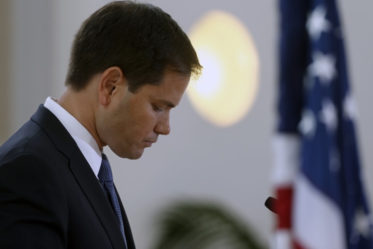 Sen. Marco Rubio, R-Fla., looks at his notes as he speaks at the Faith and Freedom Coalition Road to Majority Conference in Washington on Thursday, June 13, 2013.