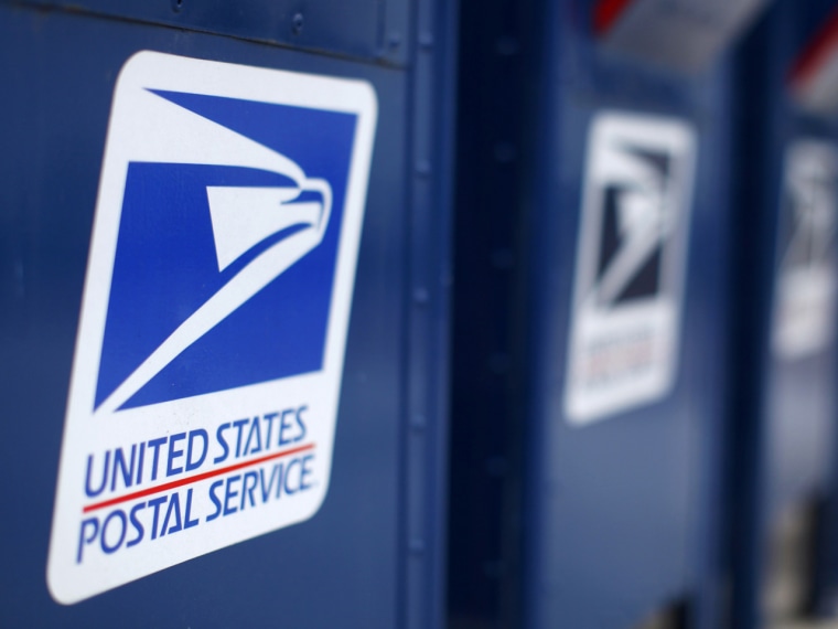 Image: A view shows U.S. postal service mail boxes at a post office in Encinitas