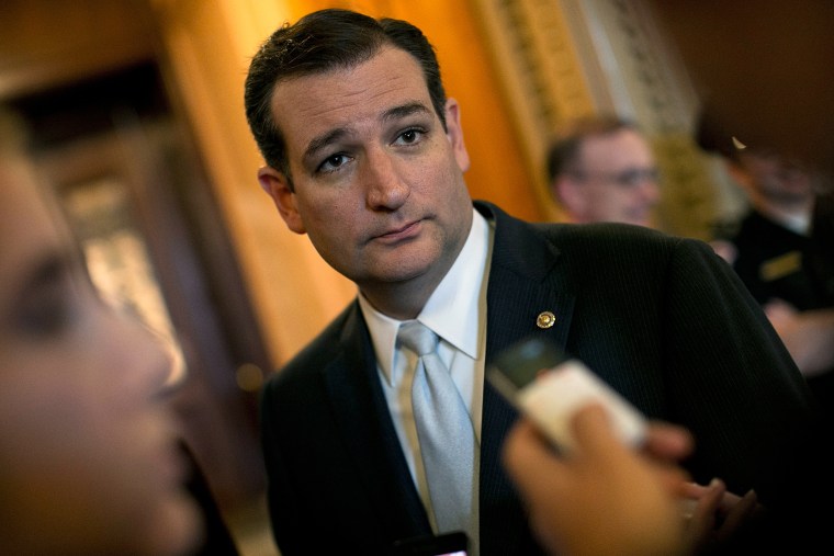 Sen. Ted Cruz (R-TX) (C) talks with reporters following a meeting at the White House between Republican members of the U.S. Senate with U.S. President Barack Obama