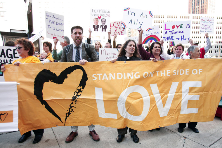 People in favor of same-sex marriage rally at the U.S. Courthouse, October 16, 2013 in Detroit, Michigan.