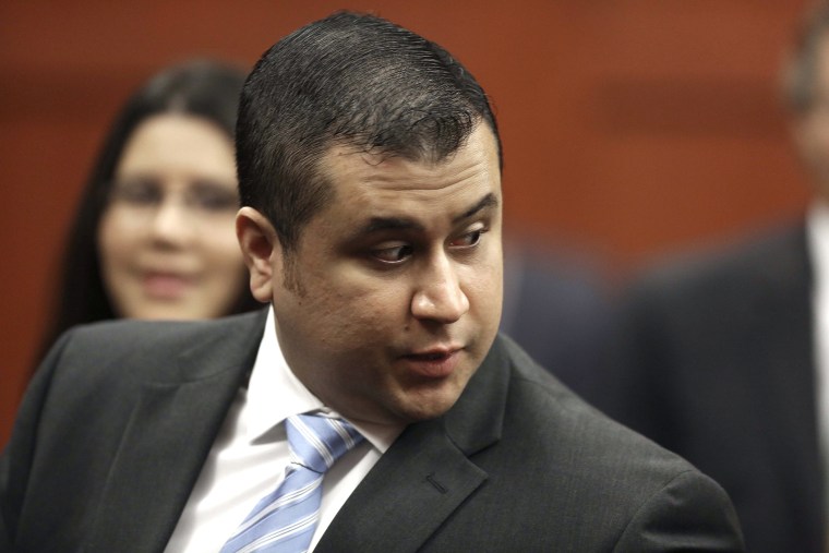 In this Monday, July 1, 2013 photo, George Zimmerman enters the Seminole County Courthouse, in Sanford, Fla., during his trial on second degree murder for the killing of Trayvon Martin.
