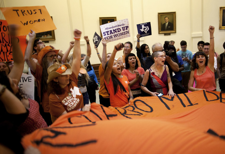 Abortion rights supporters rally on the floor of the State Capitol's rotunda in Austin, Texas on Friday, July 12, 2013.
