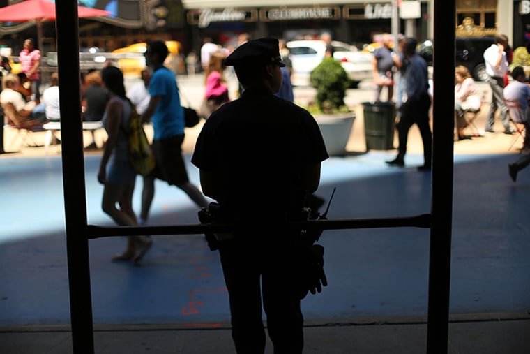 Police stand guard in Times Square on July 10, 2012 in New York City.