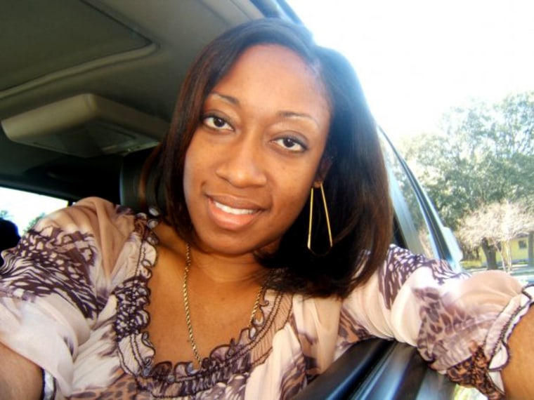 This undated family photo provided by Lincoln B. Alexander shows, Marissa Alexander in her car in Tampa, Fla.