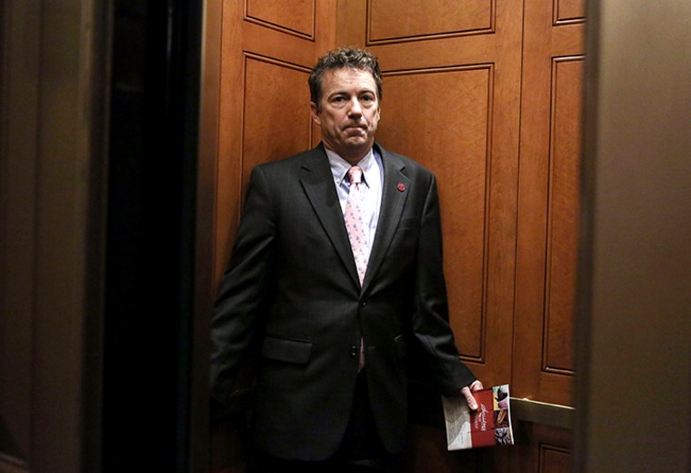 U.S. Senator Rand Paul (R-KY) leaves after a caucus meeting at the Capitol February 14, 2013 on Capitol Hill in Washington, DC.