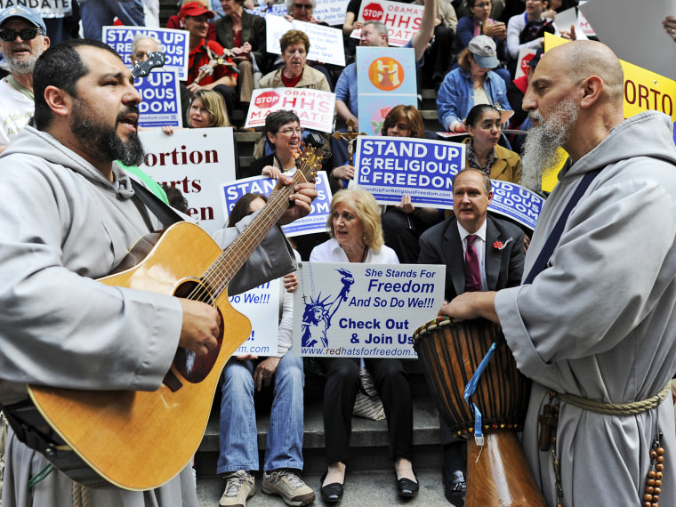 Demonstrators protest during a \"Stand Up for Religious Freedom\" rally, at Federal Hall National Memorial in New York on March 23, 2012.