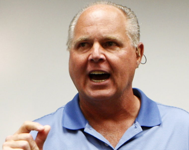 Rush Limbaugh speaks during a news conference in Honolulu.