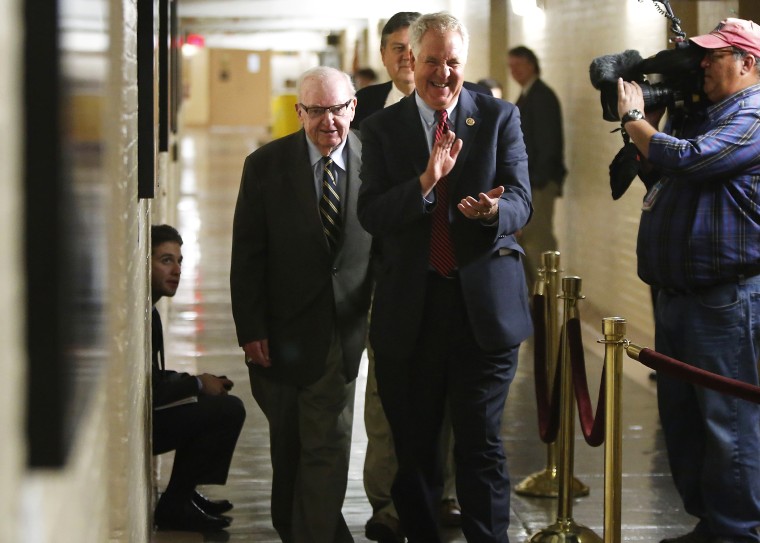 U.S. Representatives Shimkus and Coble arrive for a late night closed-door meeting of the House Republican caucus during a rare Saturday session at the U.S. Capitol