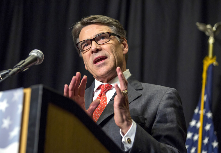 Texas Gov. Rick Perry speaks at the Polk County Republican Party fall fundraiser dinner at the Embassy Suites in Des Moines, Iowa Thursday, Nov. 7, 2013.
