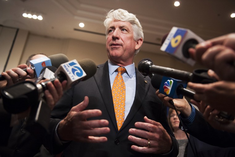 Democratic Attorney General candidate Mark Herring speaks with reporters