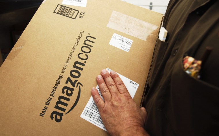 An Amazon.com package is prepared for shipment in Palo Alto, Calif.