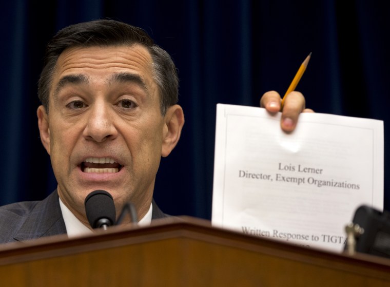 House Oversight Committee Chairman Rep. Darrell Issa, R-Calif. holds up a document on Capitol Hill in Washington, Wednesday, May 22, 2013.