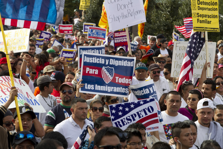 Demonstrators march towards Capitol Hill during a immigration march and rally in Washington, D.C. October 8, 2013.