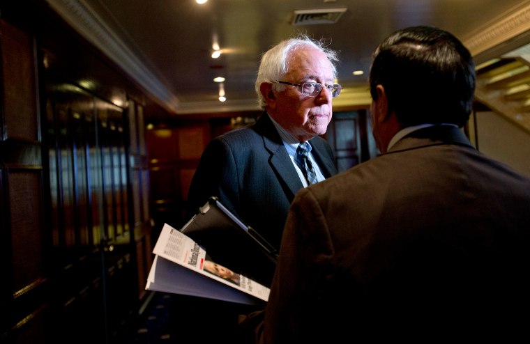 Sen. Bernie Sanders speaks to a reporter at the National Press Club in Washing on Dec. 5, 2012.