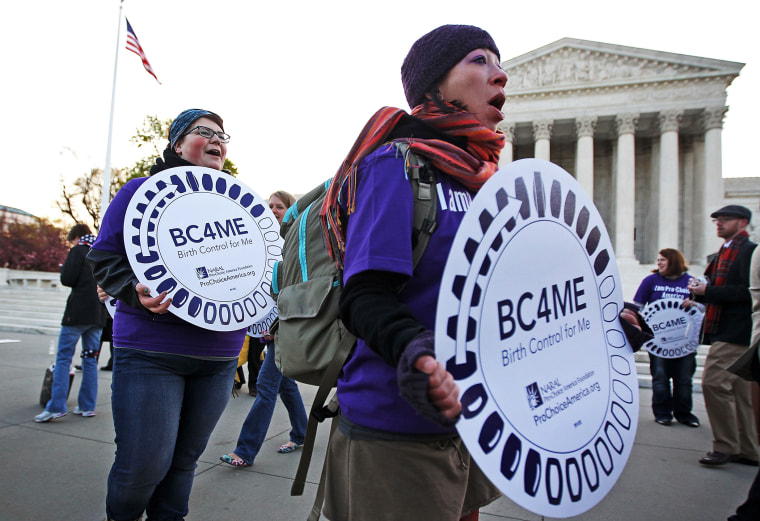 Pro-Obamacare supporters in front of the U.S. Supreme Court, March 27, 2012.