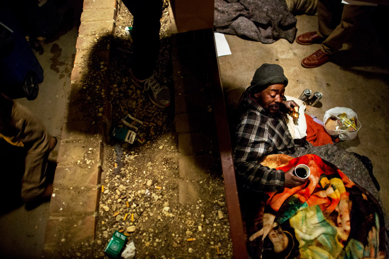 Michael Williams prepares to sleep for the night in Washington D.C., Jan. 31, 2013.