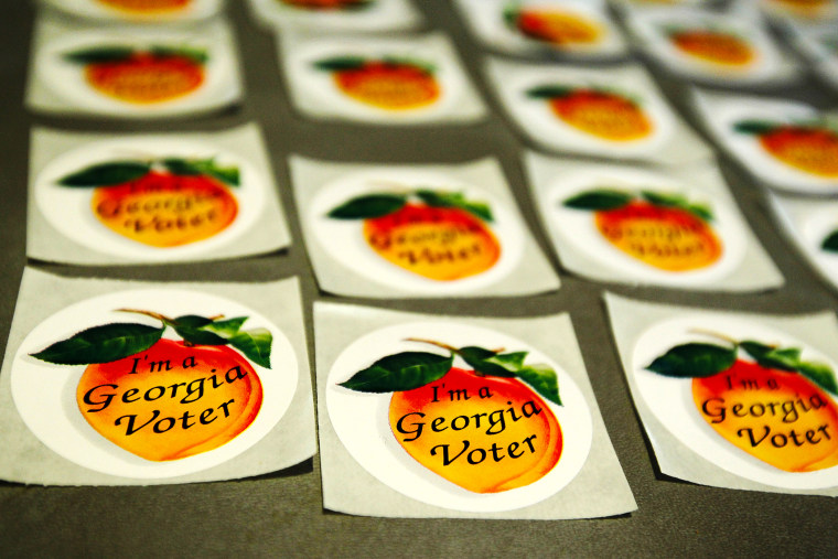 \"I'm a Georgia Voter\" stickers are seen at a polling station in Sandy Springs, Georgia, March 6, 2012.
