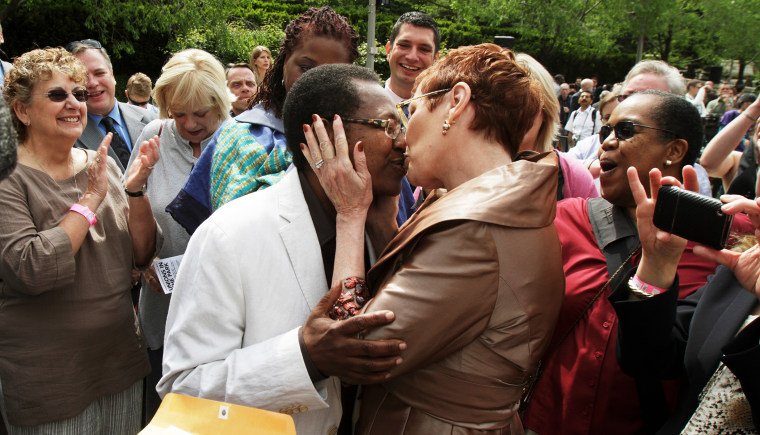 Vernita Gray (L) and Pat Ewert kiss after their Civil Union ceremony in Chicago, June 2, 2011.