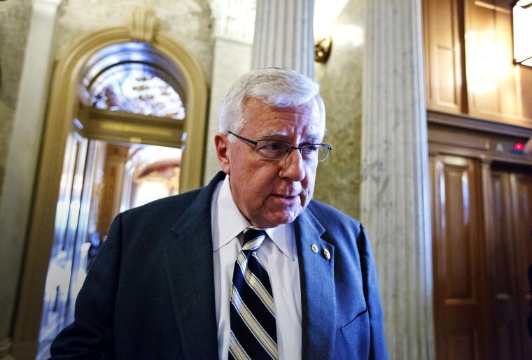 Sen. Mike Enzi pauses for questions on Capitol Hill in Washington,  May 8, 2012.
