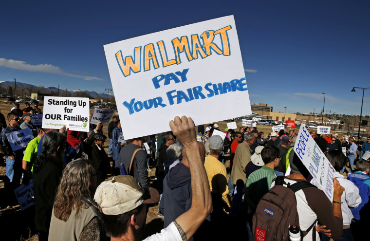 Colorado Walmart employees and supporters join nationwide protests, in front of a Walmart store in Lakewood, Colo. on Nov. 29, 2013.