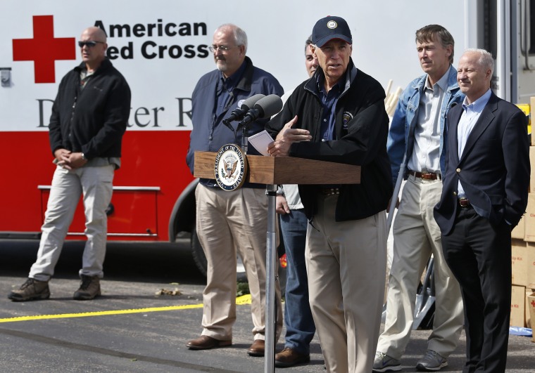 Rep. Mike Coffman, R-Colo., following a day in which Vice President Biden and others surveyed area flood damage by helicopter, in Greeley, Colo., Monday Sept. 23, 2013.