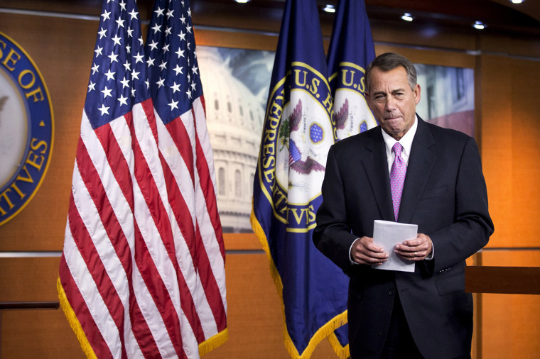 House Speaker John Boehner of Ohio leaves a news conference on Capitol Hill in Washington on Dec. 5, 2013.