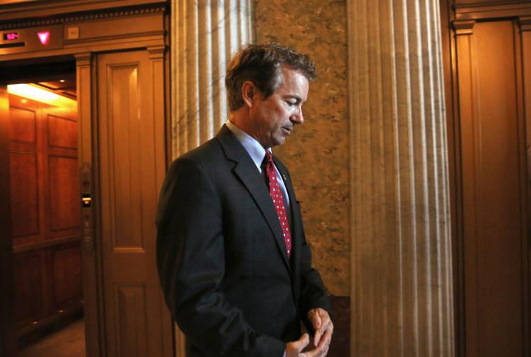 Sen. Rand Paul (R-KY) arrives at the Senate Republican Policy luncheon at the U.S. Capitol on Oct. 15, 2013 on Capitol Hill in Washington, DC.