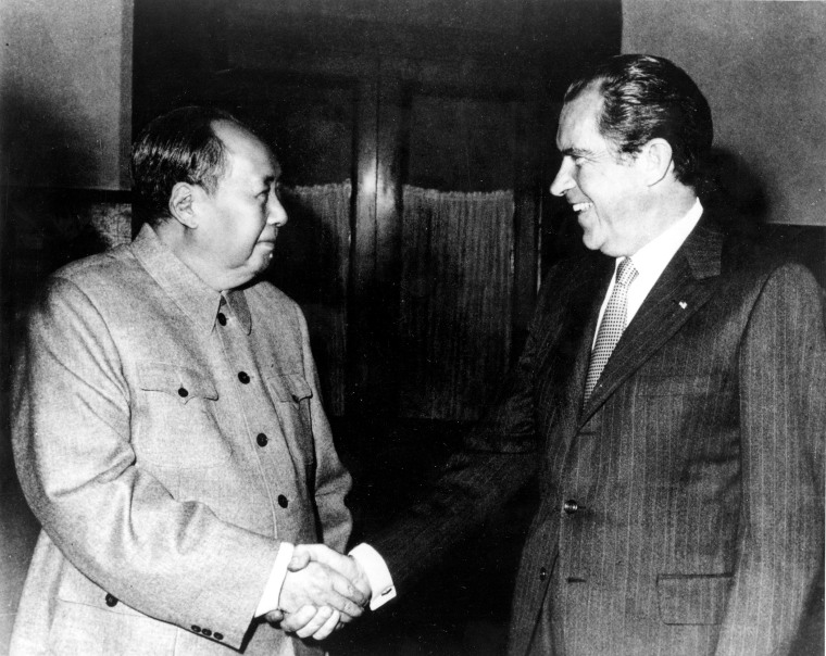 Chairman Mao Tse-tung, left, and U.S. President Richard Nixon shake hands as they meet in China in Feb. 1972.