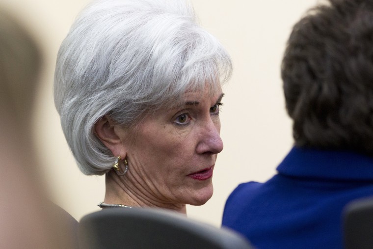 Kathleen Sebelius sits in the audience before President Barack Obama arrives to speak about the ACA in Washington, Dec. 3, 2013.