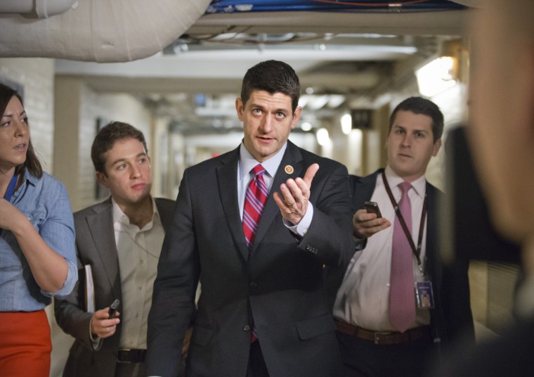 House Budget Committee Chairman Rep. Paul Ryan, R-Wis., walking through a basement corridor on Capitol Hill in Washington, Wednesday, Dec. 11, 2013.