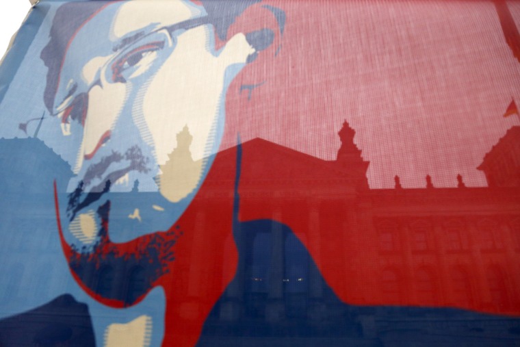 A flag depicting fugitive former U.S. National Security Agency contractor Edward Snowden, during a demonstration.