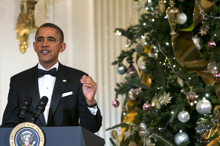 United States President Barack Obama delivers remarks during a reception at the White House for the 2013 Kennedy Center Honorees on December 8, 2013.