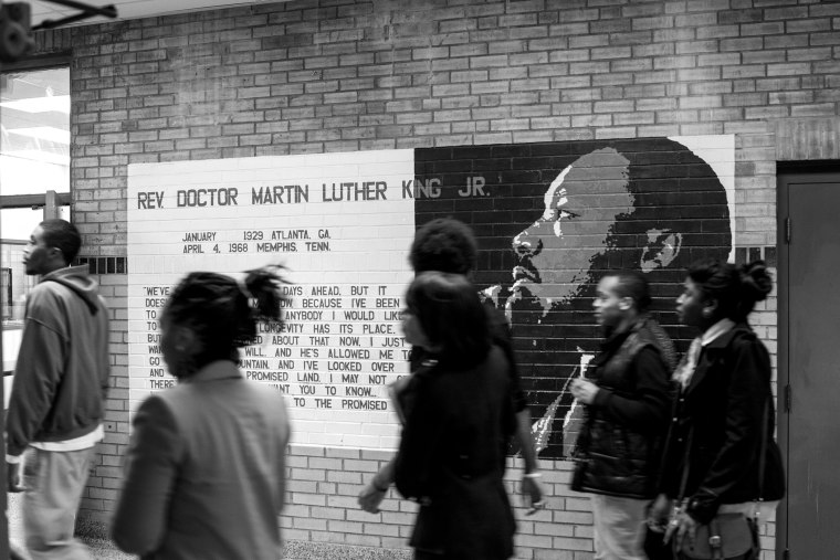 Students walk the halls of Normandy High School, where hundreds of students transferred over the summer.