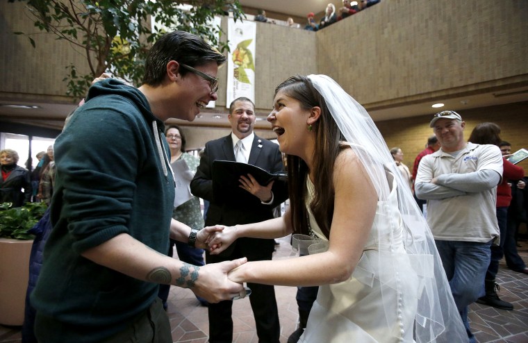 Jax and Heather Collins get married at the Salt Lake County clerk's office, Dec 23, 2013.